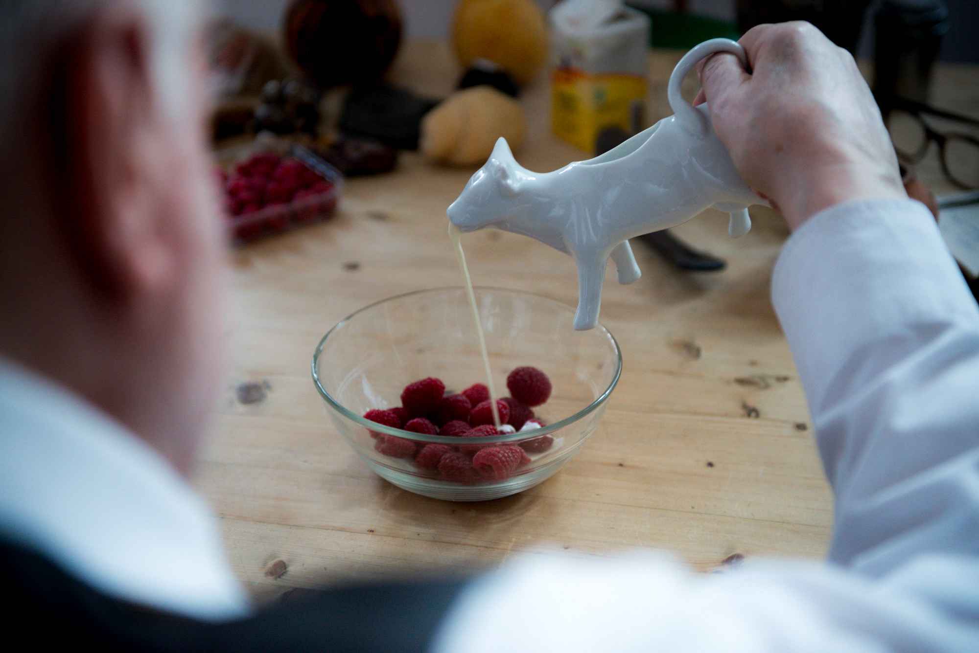 Himbeeren und Obers werden zu einer Metapher vereinigt